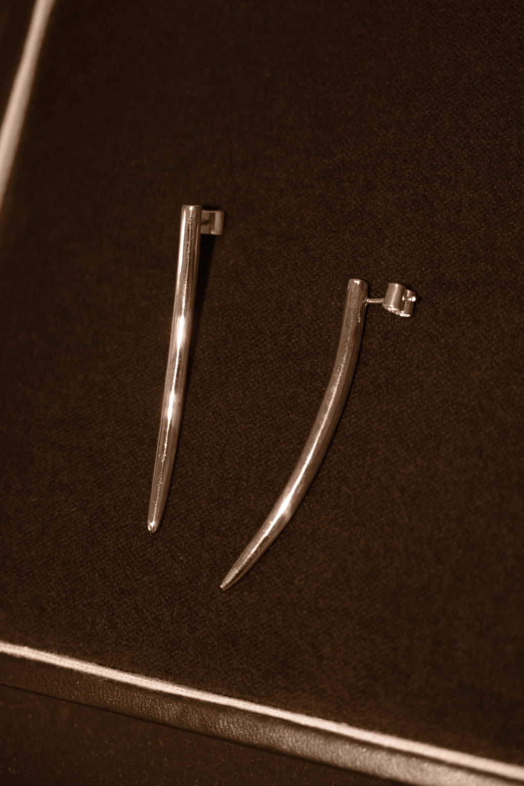 Uma Legorreta Fang earrings pair, editorial.