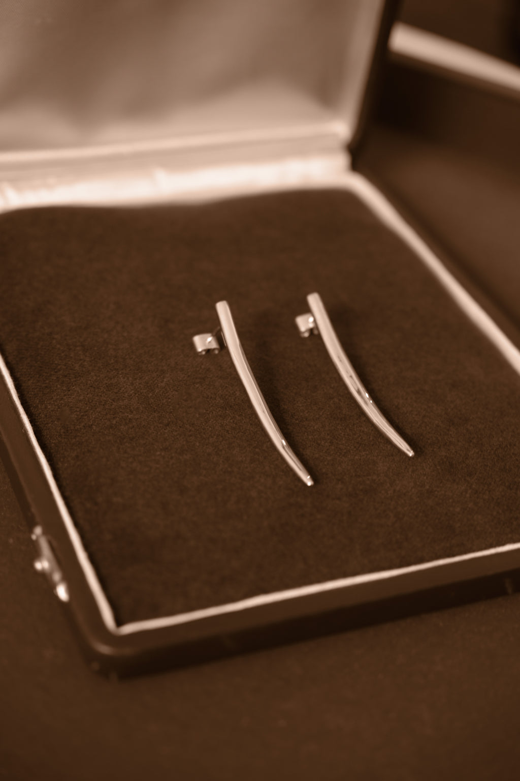 Uma Legorreta Fang earrings pair, editorial.