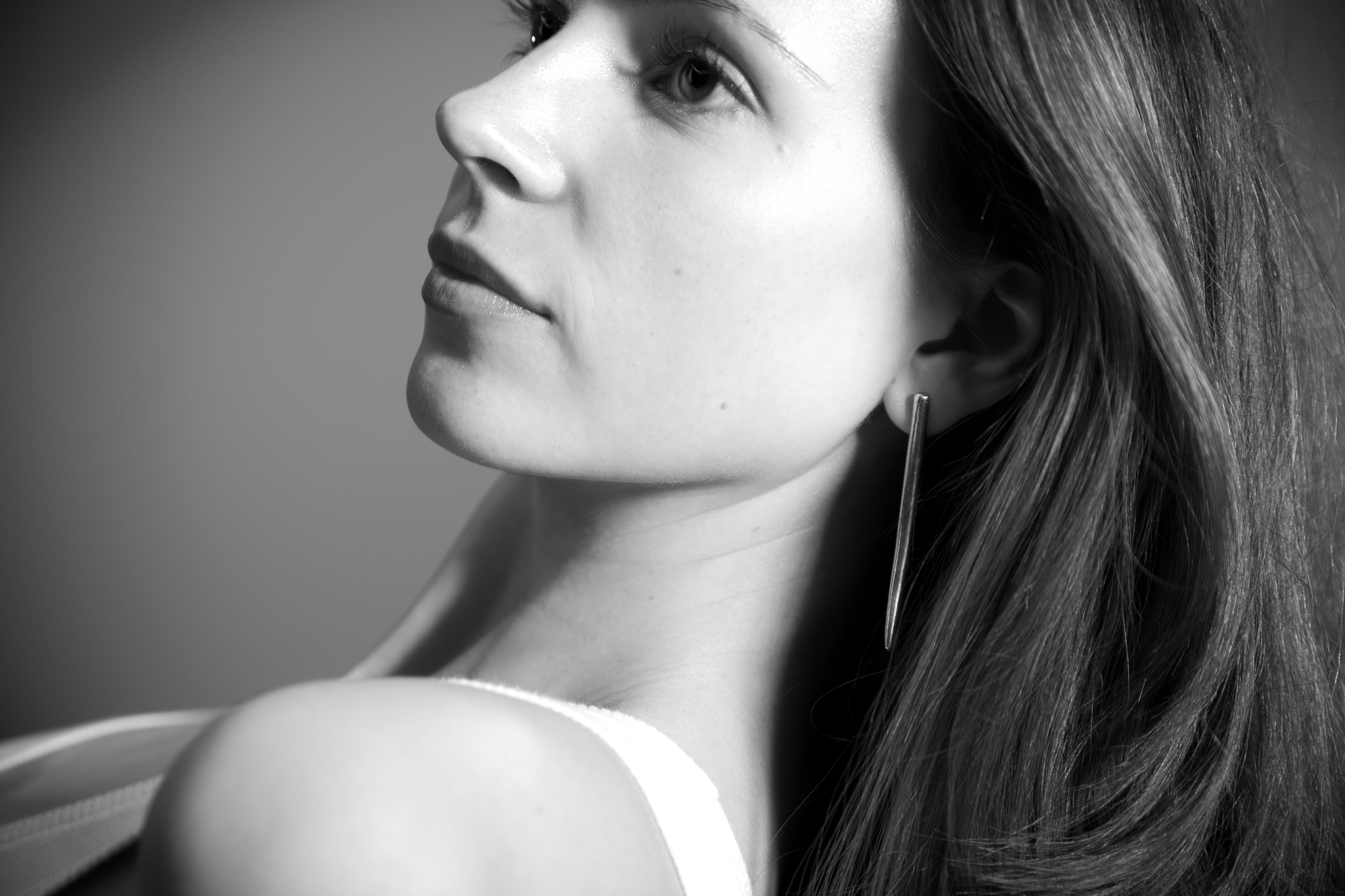 Uma Legorreta Fang earrings pair worn by model,  editorial.