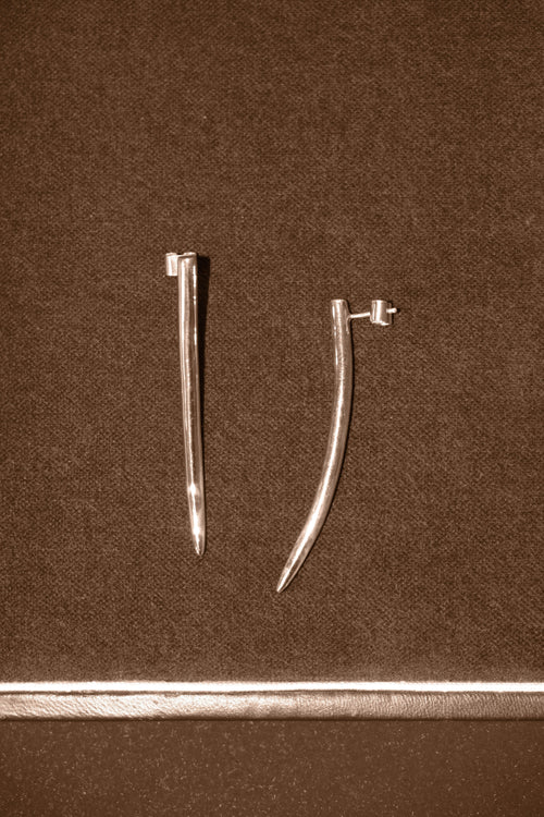 Uma Legorreta Fang earrings pair, editorial.
