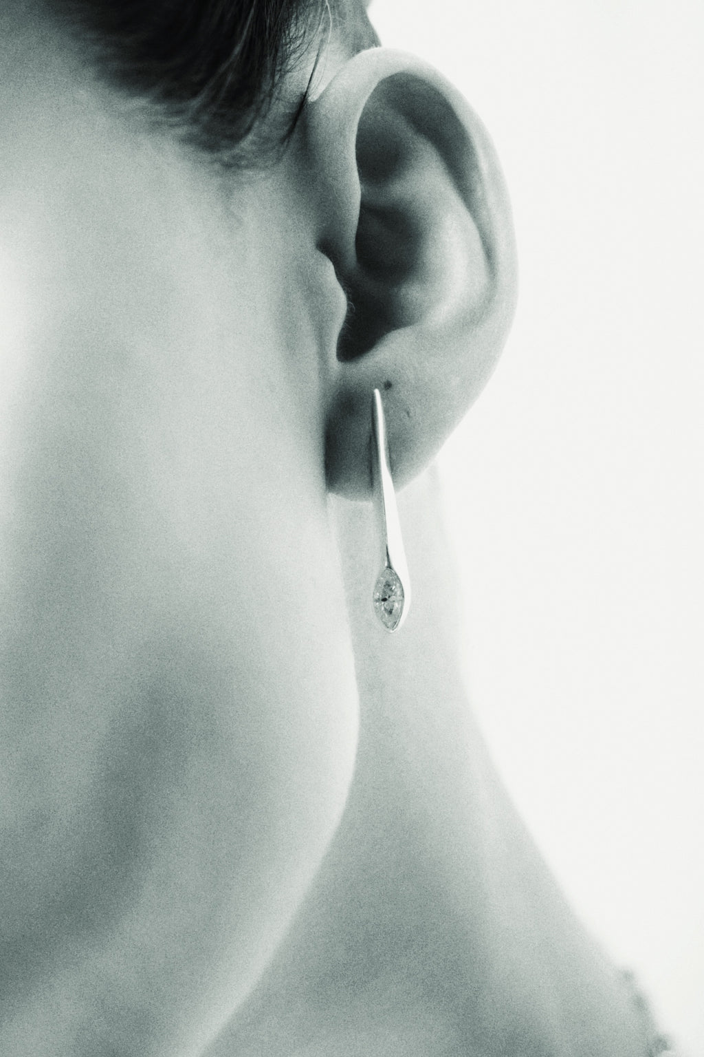 Uma Legorreta Thorn earring worn by model,  sterling silver moissanite marquise pair , editorial